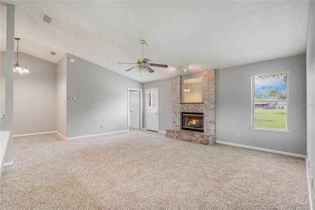 2212 Cortez Ct, Middleburg, FL 32068 - unfurnished living room with lofted ceiling, carpet, a fireplace, baseboards, and ceiling fan