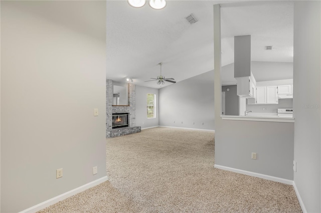2212 Cortez Ct, Middleburg, FL 32068 - unfurnished living room featuring a ceiling fan, carpet flooring, baseboards, and lofted ceiling
