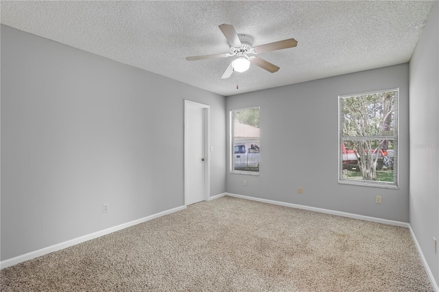 2212 Cortez Ct, Middleburg, FL 32068 - spare room with a textured ceiling, carpet flooring, ceiling fan, and baseboards