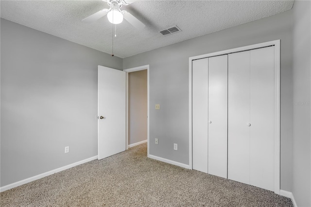 2212 Cortez Ct, Middleburg, FL 32068 - unfurnished bedroom with a textured ceiling, carpet, baseboards, a closet, and ceiling fan