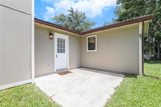 2212 Cortez Ct, Middleburg, FL 32068 - property entrance featuring a patio area and a yard