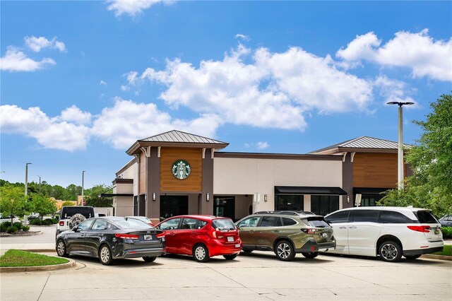 2212 Cortez Ct, Middleburg, FL 32068 - view of building exterior with uncovered parking
