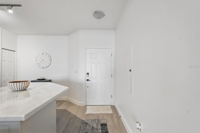 80 Surfview Dr Unit 511, Palm Coast, FL 32137 - entryway featuring light wood-style floors and baseboards