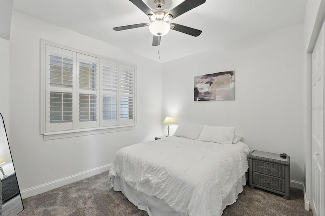 80 Surfview Dr Unit 511, Palm Coast, FL 32137 - bedroom featuring carpet flooring, baseboards, and a ceiling fan