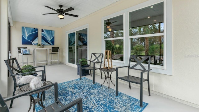 151 Greenwood Dr, Palm Coast, FL 32137 - sunroom with finished concrete flooring