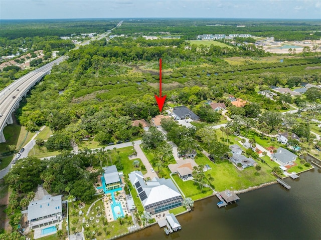 135 Lambert Ave, Flagler Beach, FL 32136 - aerial view of property and surrounding area with a large body of water and nearby suburban area