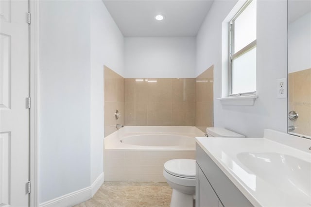 bathroom featuring toilet, a bath, vanity, and recessed lighting