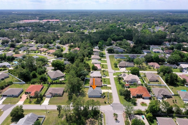 aerial overview of property's location featuring nearby suburban area