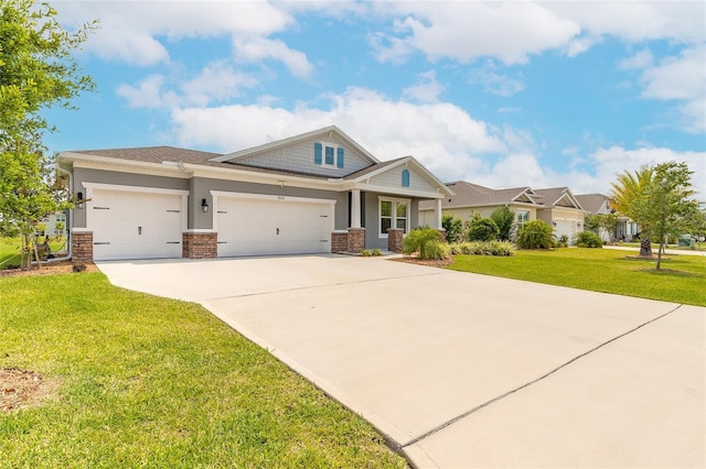 2840 Monaghan Dr, Ormond Beach, FL 32174 - craftsman house featuring an attached garage, driveway, and a front lawn