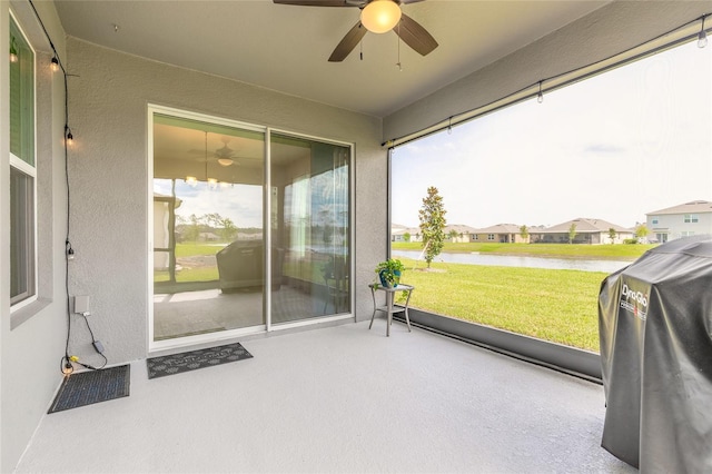 2840 Monaghan Dr, Ormond Beach, FL 32174 - sunroom / solarium with ceiling fan, a water view, and a residential view