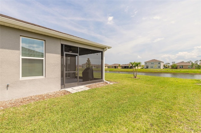 2840 Monaghan Dr, Ormond Beach, FL 32174 - view of grassy yard with a water view and a sunroom