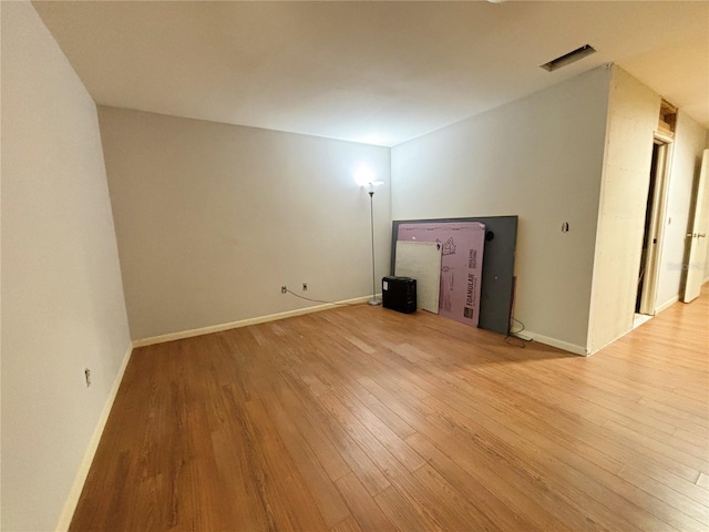 20 Blakeshire Pl, Palm Coast, FL 32137 - empty room with light wood-style flooring and baseboards