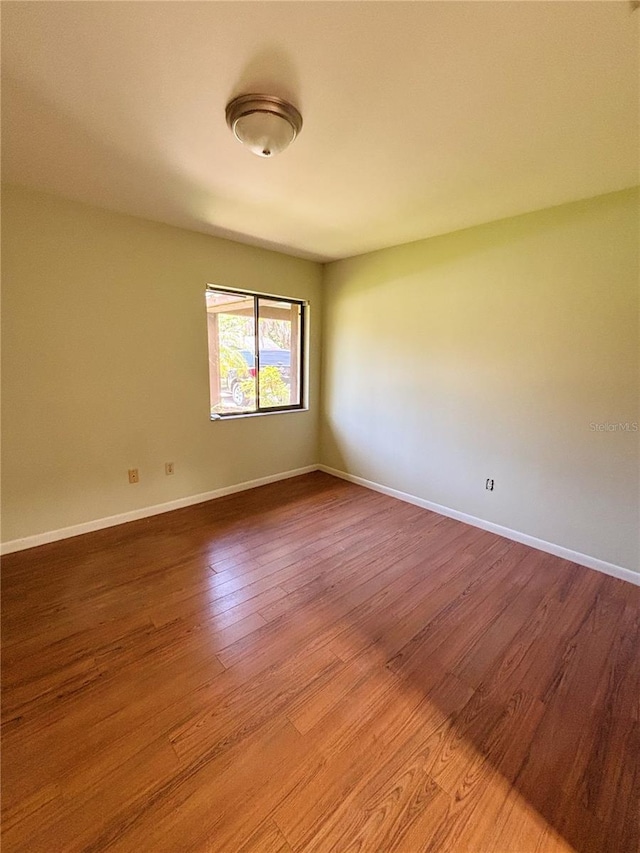 20 Blakeshire Pl, Palm Coast, FL 32137 - empty room with light wood-style floors and baseboards