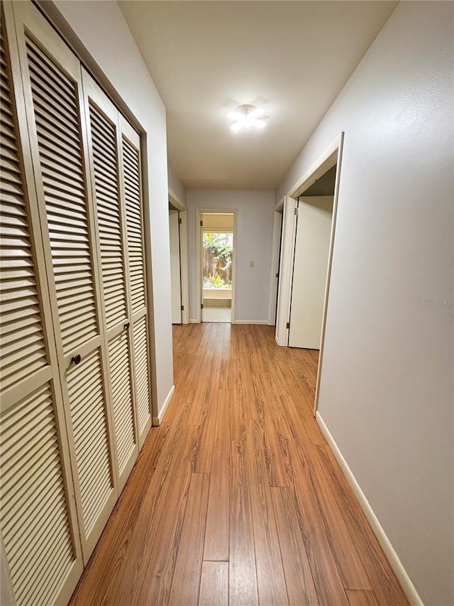 20 Blakeshire Pl, Palm Coast, FL 32137 - hallway featuring a heating unit, light wood-type flooring, and baseboards