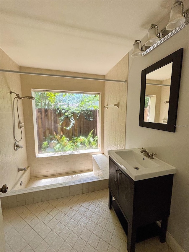 20 Blakeshire Pl, Palm Coast, FL 32137 - bathroom featuring tile patterned flooring, vanity, and tiled shower / bath