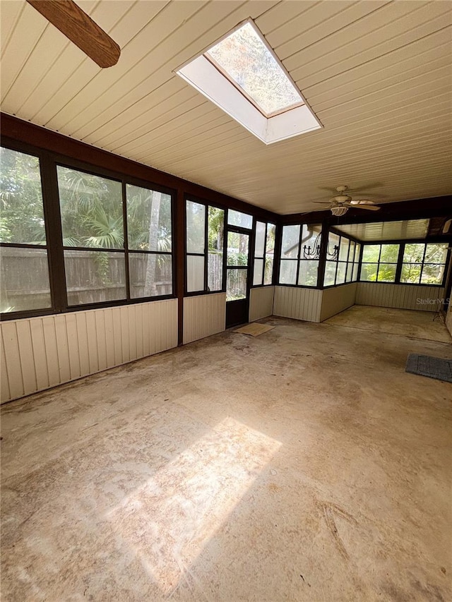 20 Blakeshire Pl, Palm Coast, FL 32137 - unfurnished sunroom featuring a skylight, ceiling fan, and concrete flooring
