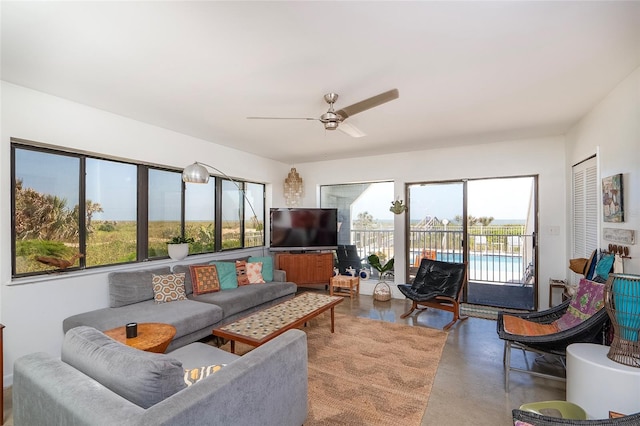 2900 Coastal Hwy Unit 1, Saint Augustine, FL 32084 - living area with finished concrete floors and ceiling fan