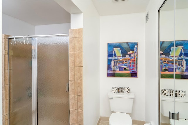2900 Coastal Hwy Unit 1, Saint Augustine, FL 32084 - bathroom with toilet, a shower stall, and baseboards