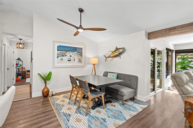 54 Fordham Ln, Palm Coast, FL 32137 - dining area with wood finished floors, vaulted ceiling, a ceiling fan, and baseboards