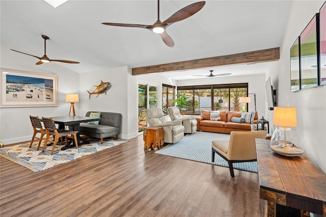 54 Fordham Ln, Palm Coast, FL 32137 - living area featuring ceiling fan, wood finished floors, beamed ceiling, and baseboards