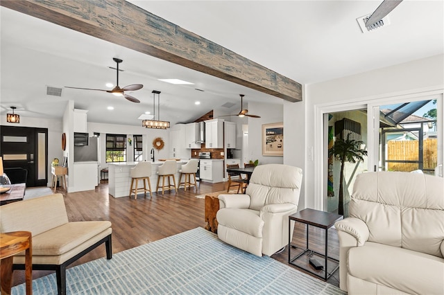 54 Fordham Ln, Palm Coast, FL 32137 - living area featuring a ceiling fan, wood finished floors, and recessed lighting