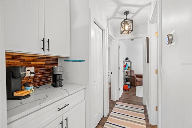 54 Fordham Ln, Palm Coast, FL 32137 - hallway featuring dark wood-style floors