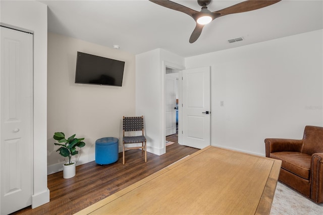 54 Fordham Ln, Palm Coast, FL 32137 - living area featuring wood finished floors, baseboards, and a ceiling fan