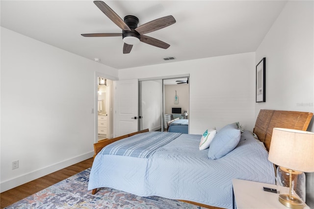 54 Fordham Ln, Palm Coast, FL 32137 - bedroom with baseboards, wood finished floors, a closet, and ceiling fan