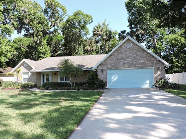 543 Sandy Oaks Blvd, Ormond Beach, FL 32174 - ranch-style house featuring an attached garage, brick siding, and concrete driveway
