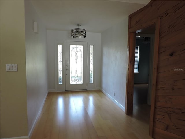 543 Sandy Oaks Blvd, Ormond Beach, FL 32174 - foyer with baseboards and light wood finished floors
