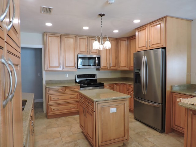 543 Sandy Oaks Blvd, Ormond Beach, FL 32174 - kitchen featuring appliances with stainless steel finishes, a kitchen island, decorative light fixtures, recessed lighting, and light stone countertops