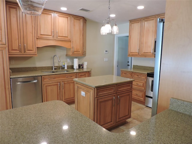 543 Sandy Oaks Blvd, Ormond Beach, FL 32174 - kitchen with a sink, stainless steel appliances, light stone counters, recessed lighting, and pendant lighting