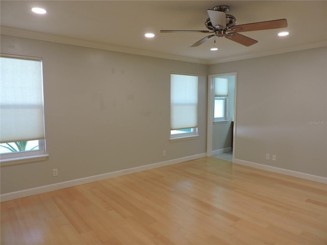 543 Sandy Oaks Blvd, Ormond Beach, FL 32174 - spare room featuring healthy amount of natural light, crown molding, light wood-style floors, ceiling fan, and recessed lighting