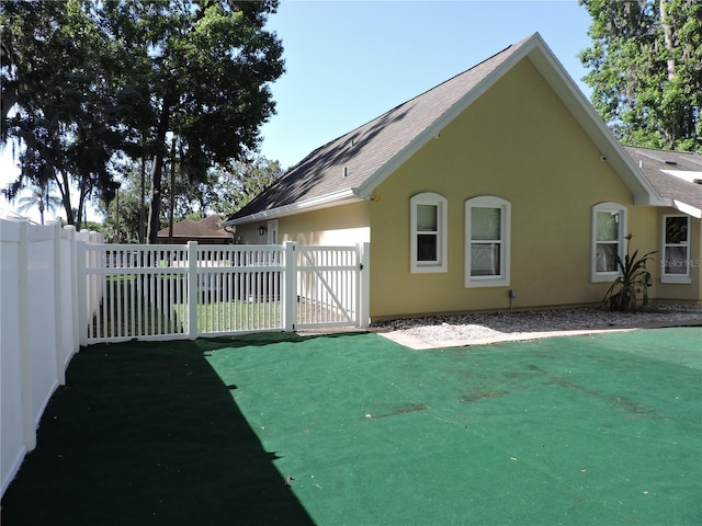 543 Sandy Oaks Blvd, Ormond Beach, FL 32174 - view of yard with a gate