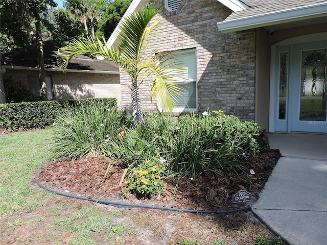 543 Sandy Oaks Blvd, Ormond Beach, FL 32174 - view of side of home with brick siding