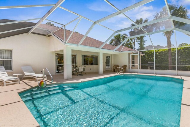 11 White Oak Ln, Palm Coast, FL 32164 - outdoor pool with a patio area and a lanai