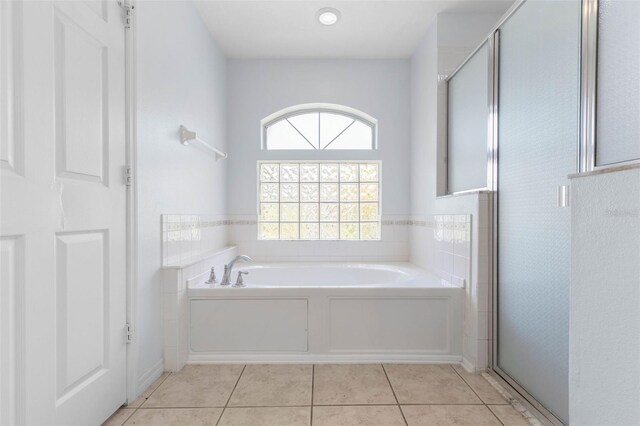 11 White Oak Ln, Palm Coast, FL 32164 - full bath with a garden tub, tile patterned floors, and a stall shower