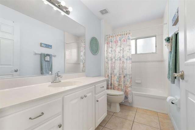 11 White Oak Ln, Palm Coast, FL 32164 - full bath with toilet, tile patterned floors, shower / bath combo, and vanity