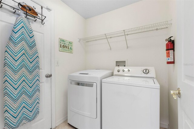 11 White Oak Ln, Palm Coast, FL 32164 - laundry area with washer and clothes dryer