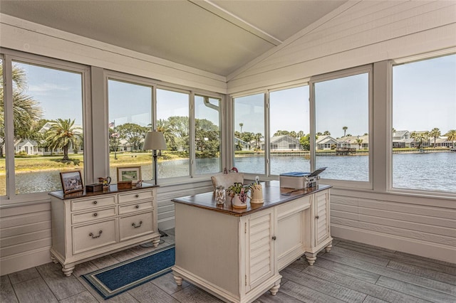 7 Bristol Dr, Palm Coast, FL 32137 - sunroom / solarium featuring vaulted ceiling, wood finished floors, a water view, and wooden walls