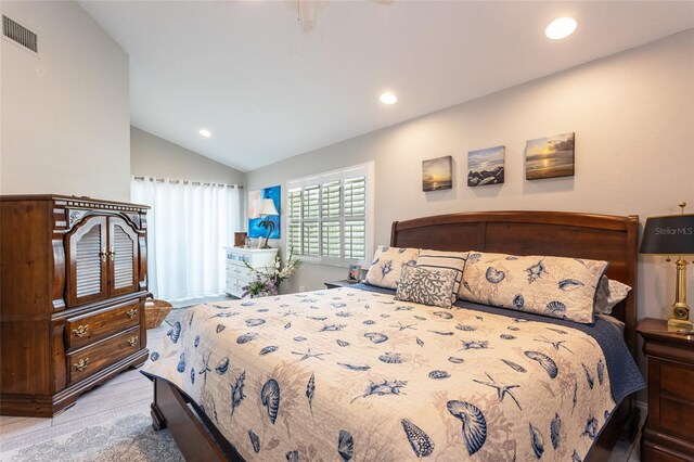 7 Bristol Dr, Palm Coast, FL 32137 - bedroom featuring lofted ceiling, recessed lighting, and wood finished floors