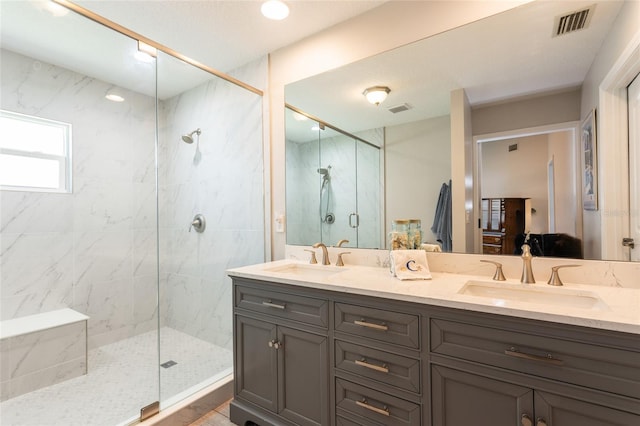 7 Bristol Dr, Palm Coast, FL 32137 - bathroom featuring a marble finish shower and double vanity