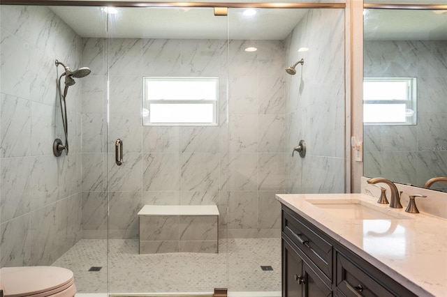 7 Bristol Dr, Palm Coast, FL 32137 - bathroom with a stall shower, vanity, and toilet