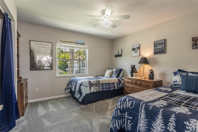 7 Bristol Dr, Palm Coast, FL 32137 - bedroom featuring a textured ceiling, carpet, baseboards, and a ceiling fan