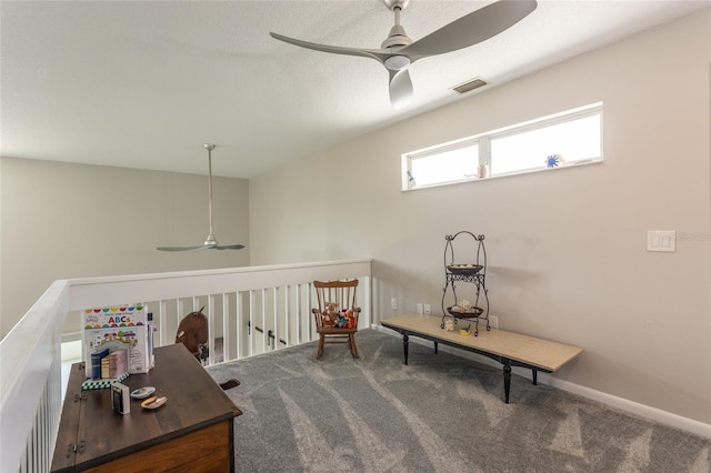 7 Bristol Dr, Palm Coast, FL 32137 - living area featuring ceiling fan, carpet, and baseboards