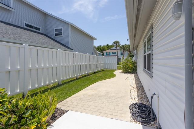 7 Bristol Dr, Palm Coast, FL 32137 - view of yard with fence and a patio area