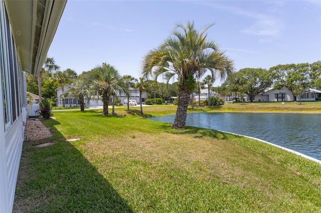 7 Bristol Dr, Palm Coast, FL 32137 - view of green lawn featuring a water view and a residential view