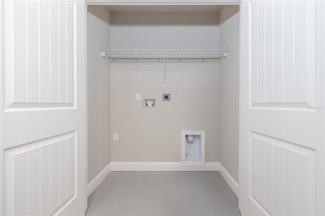 45 Providence Ln, Palm Coast, FL 32164 - clothes washing area featuring electric dryer hookup, hookup for a washing machine, and baseboards