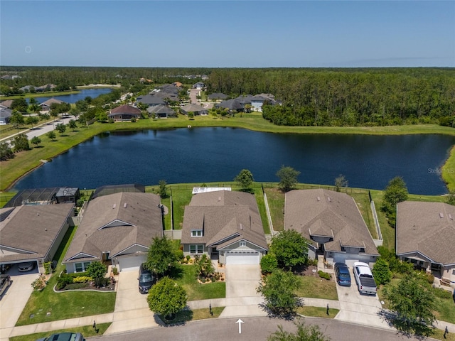 115 N Coopers Hawk Way, Palm Coast, FL 32164 - aerial view of residential area with a large body of water and a heavily wooded area