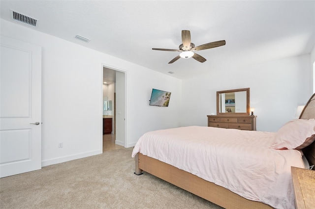 27 Bay Ct, Ormond Beach, FL 32174 - bedroom featuring carpet flooring, baseboards, ceiling fan, and ensuite bathroom